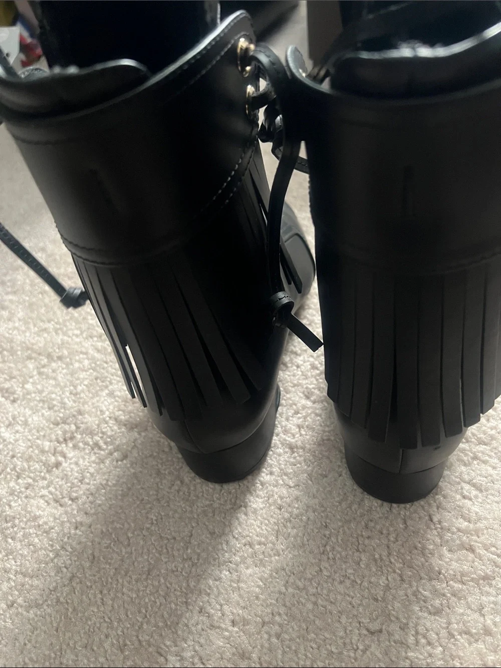 CHANEL Black Leather Heeled Ankle Boots with CC Embossing